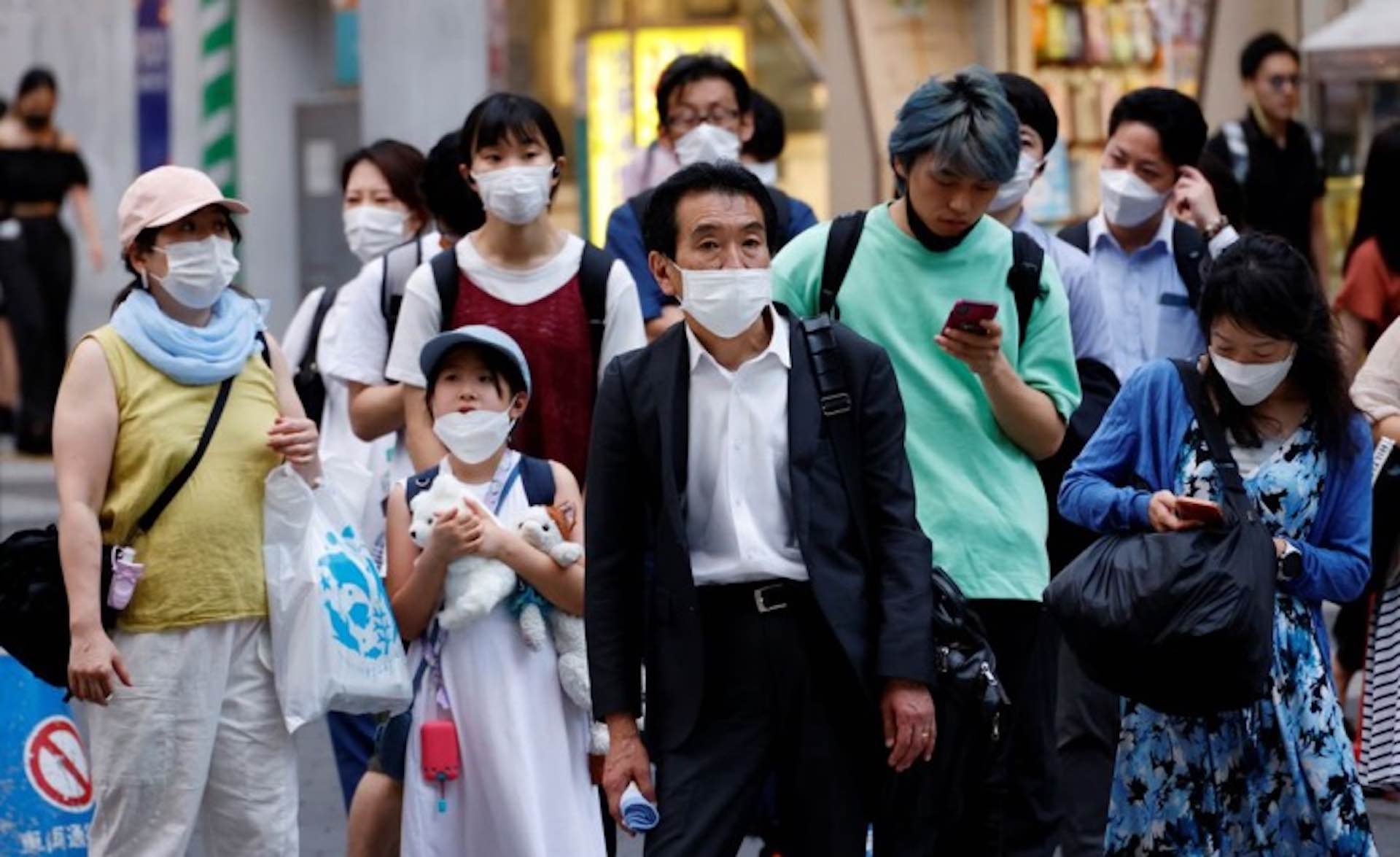 Japan considers banning hotel guests without masks